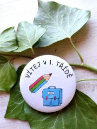 Placka pr.5cm Vítej v 1.třídě, motiv pastelka modrá
